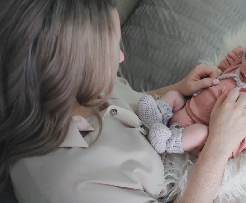 Mother with her newborn baby on Sunday, May 2, 2021. (Kaylah Baker)