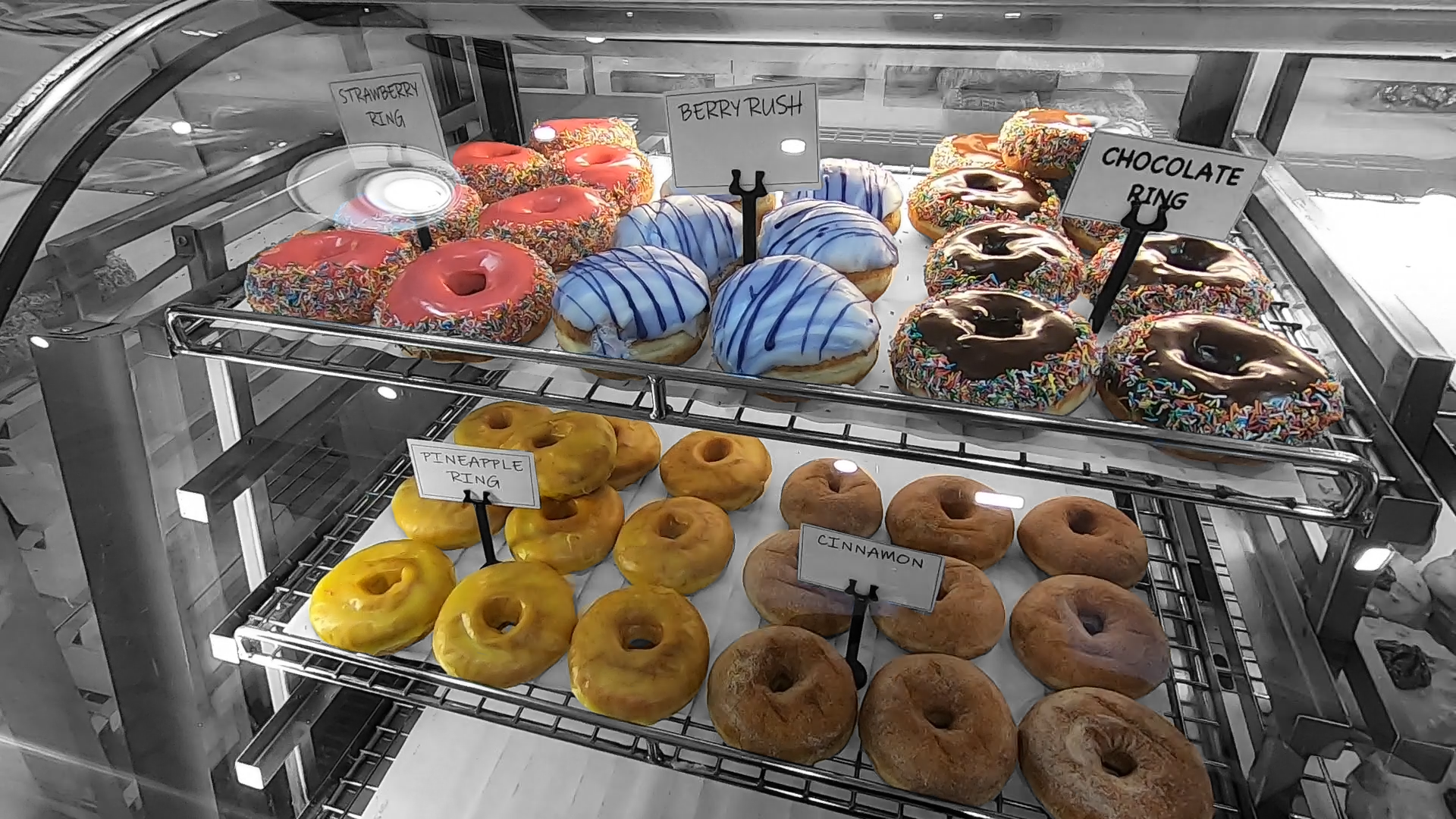 All the doughnuts in the image are in full colour.